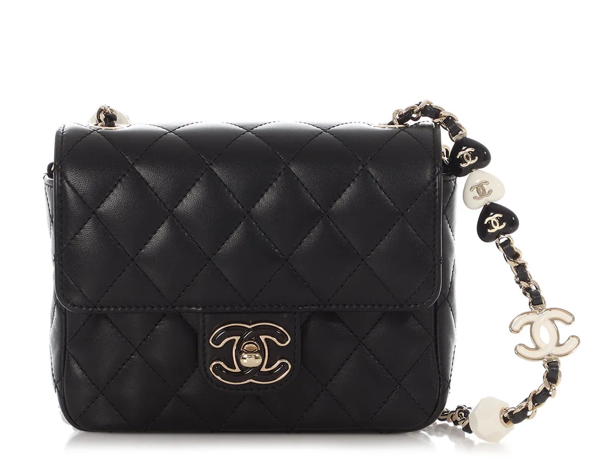 Chanel Mini Black Quilted Lambskin Heart Charms Flap