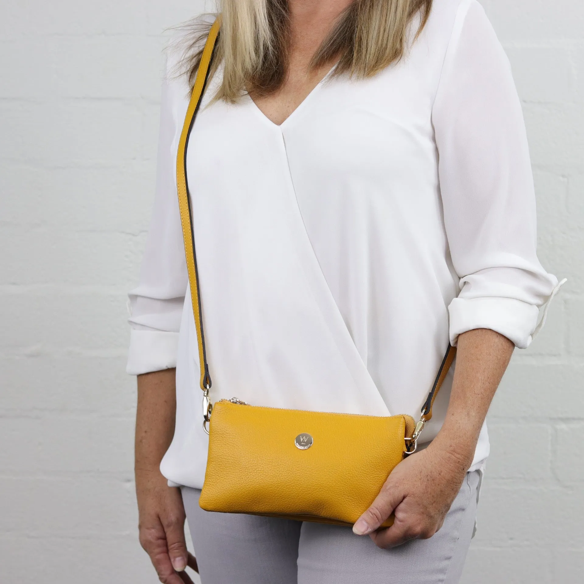 Evie pebbled leather clutch crossbody