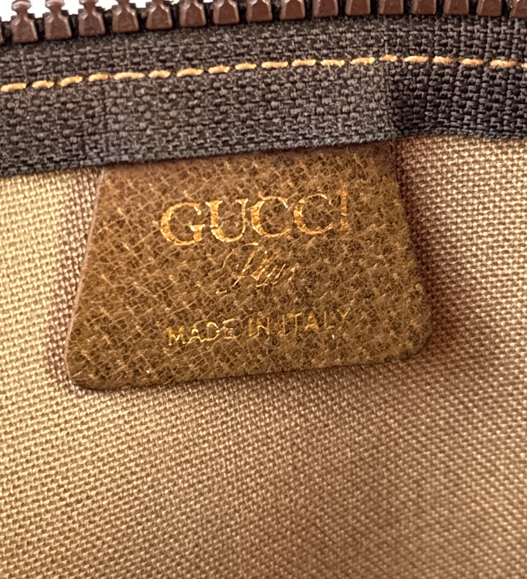 Gucci Plus signature vintage coated canvas clutch